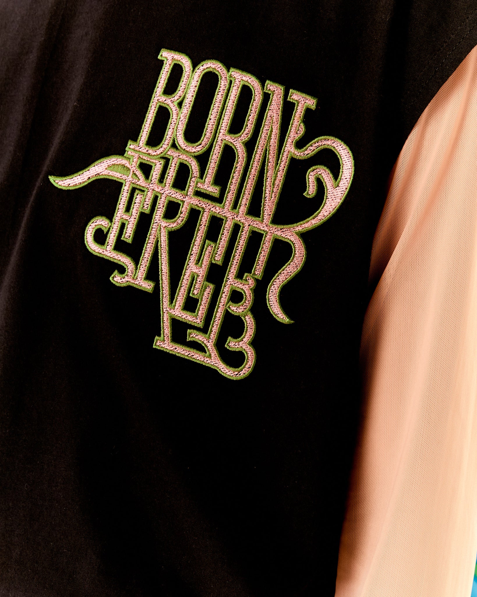 BORN FREE SLEEVELESS